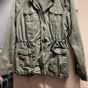 Green zip up jacket